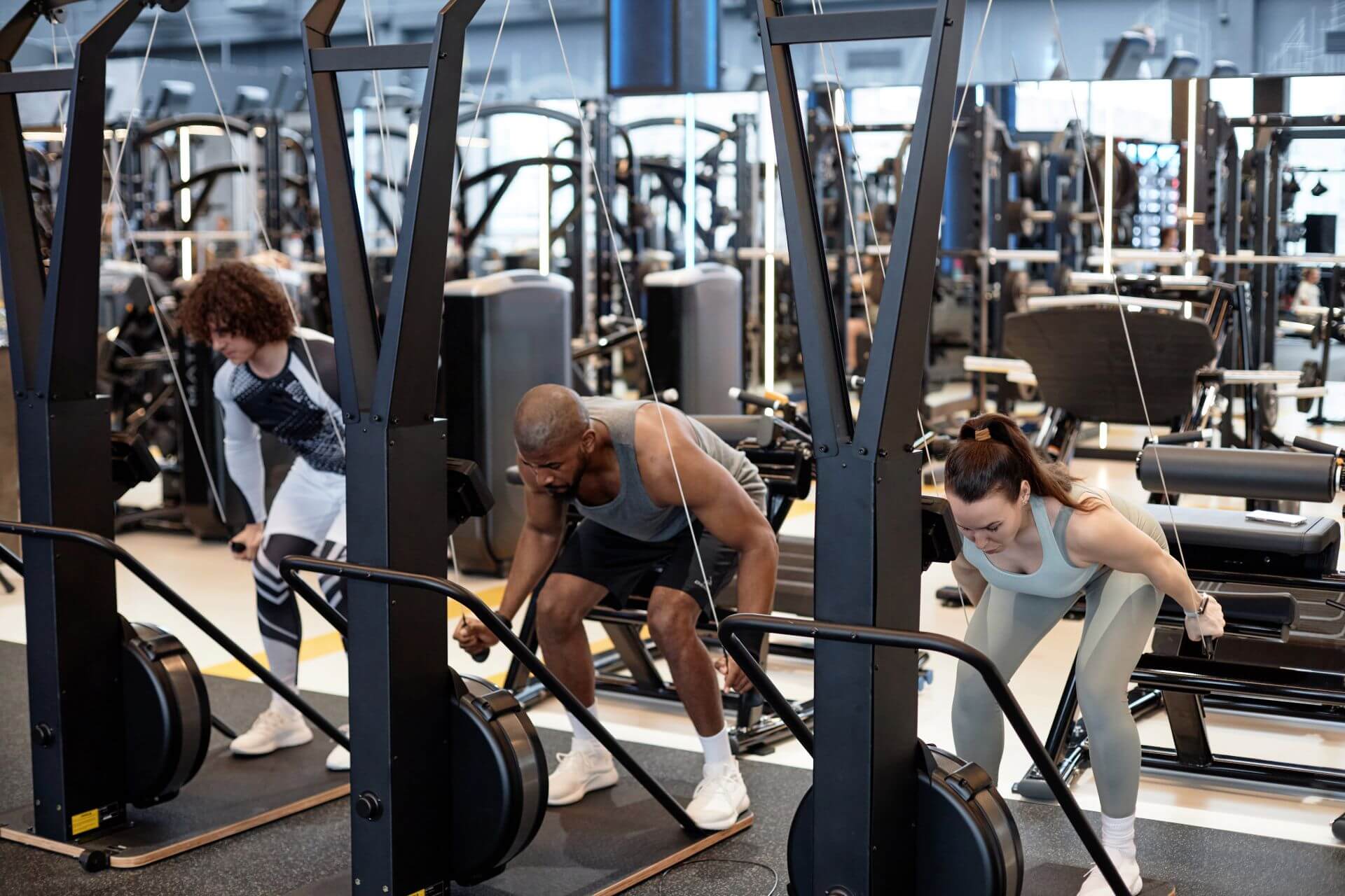 people-using-exercise-machines-in-gym-2024-05-21-22-28-13-utc.jpg